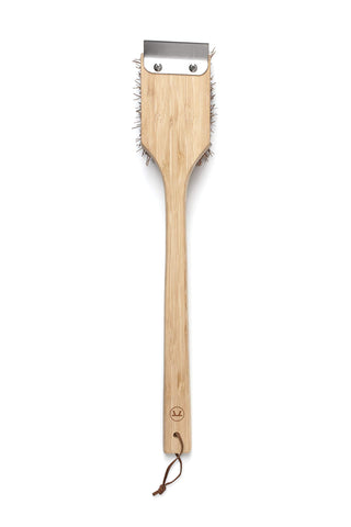 Outset grill brush with silver scraping head for versatile kitchen and grill use.