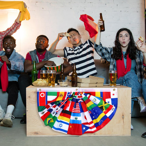 Outus world flags decor serves as party backdrop and photo spot.