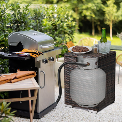 Outvita wicker propane tank cover table in brown supports fire pit and grill setups outdoors.