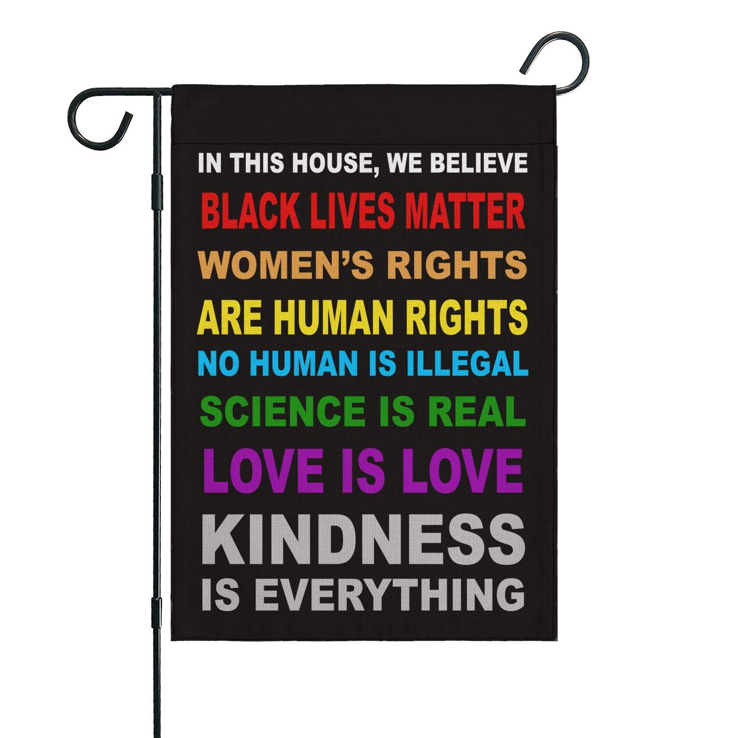 OUXIOAZ Pride flag garden banner This House We Believe design displayed outdoors.