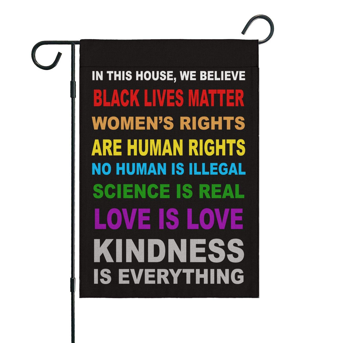 OUXIOAZ Pride flag garden banner This House We Believe design displayed outdoors.