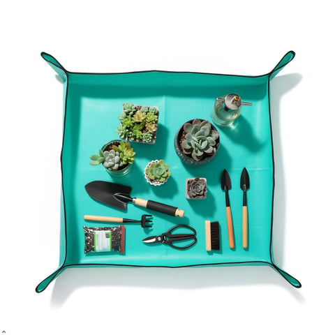 Owl Focus repotting mat simplifies cleanup during potting.