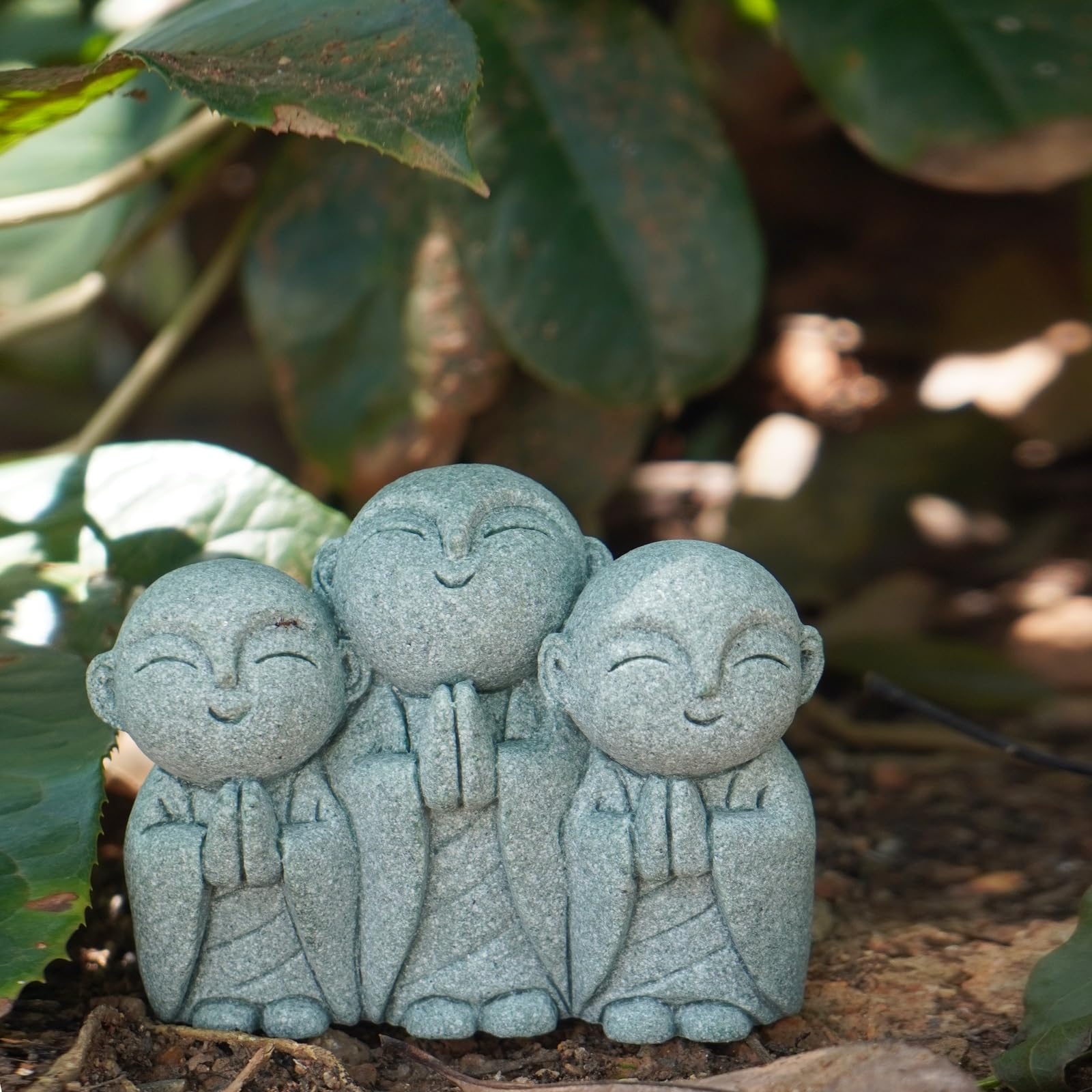 OwMell Jizo three-monk assembly forms a compact garden focal point