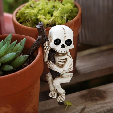 OwMell skeleton pot hugger on flowerpot adds playful Halloween charm to your garden.