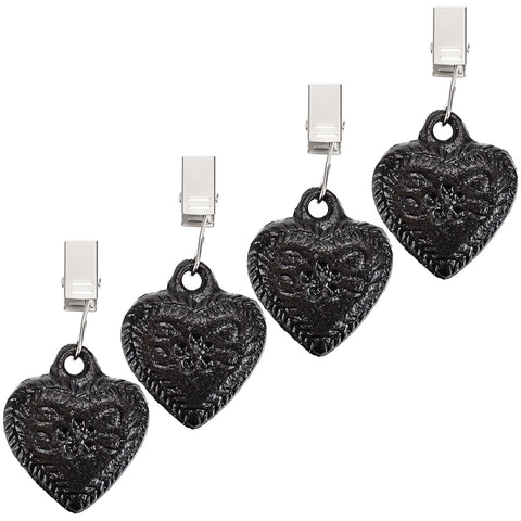 OwnMy cast iron heart clip set secures tablecloths against wind for outdoor dining.