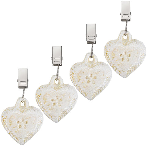 OwnMy cast iron heart tablecloth weights clip set of four keeps outdoor tables stable.