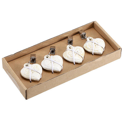 OwnMy heart-design tablecloth weights add vintage charm with practical function.
