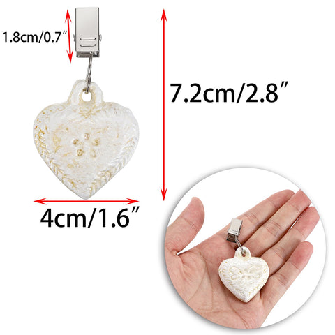 OwnMy stainless steel clip heart weights close-up shows durable clamping action.