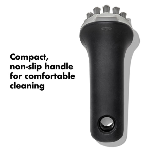 OXO Good Grips Cast Iron Brush scraper tip clears grease efficiently.
