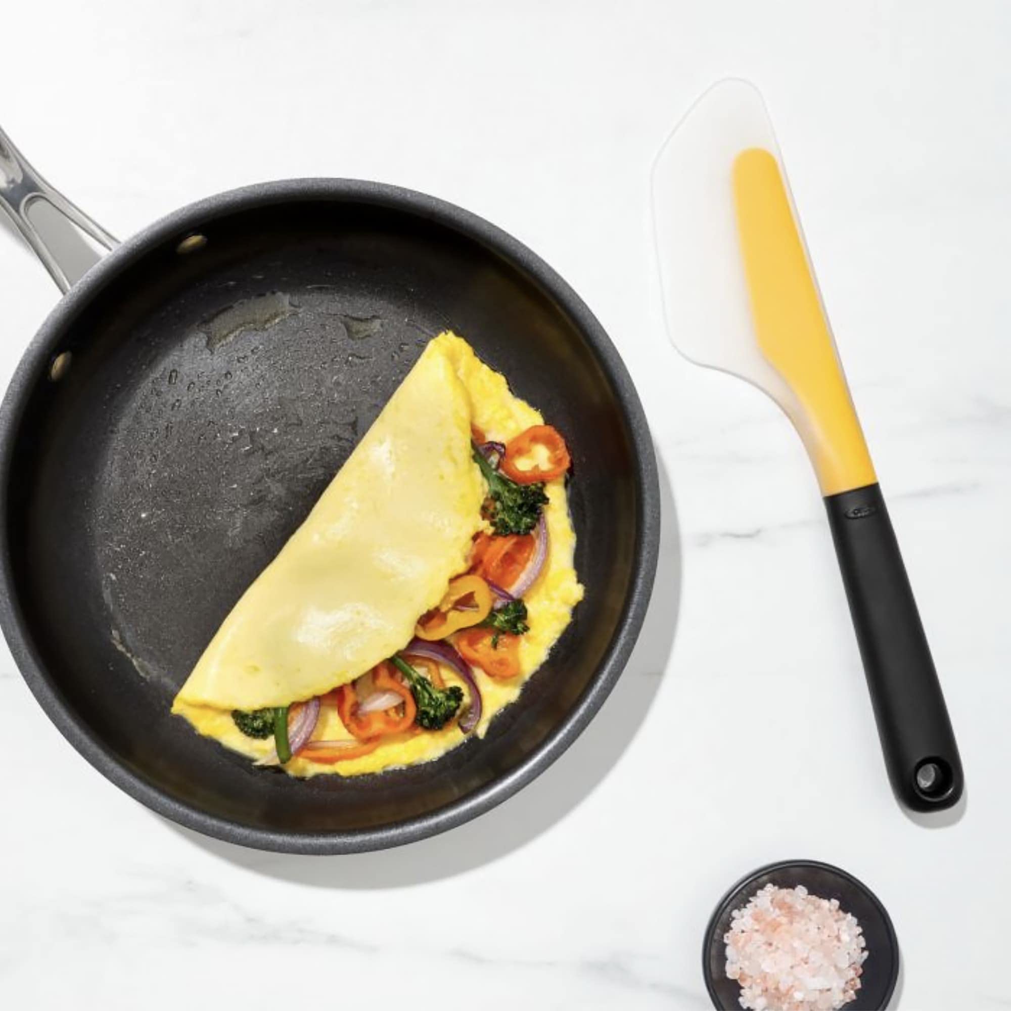OXO Good Grips dishwasher-safe omelet turner for quick cleanup.