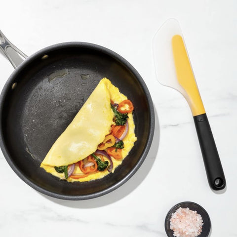 OXO Good Grips dishwasher-safe omelet turner for quick cleanup.