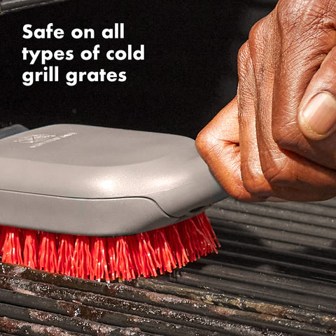 OXO Good Grips grill brush with stainless steel scraper for burnt-on residue removal