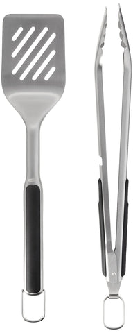Built-in bottle opener on OXO Good Grips grilling tongs for grill-side drinks.