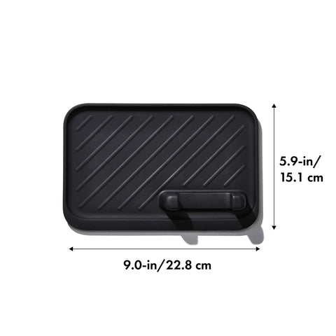 Silicone surface stays cool and easy to wipe during grilling tasks.