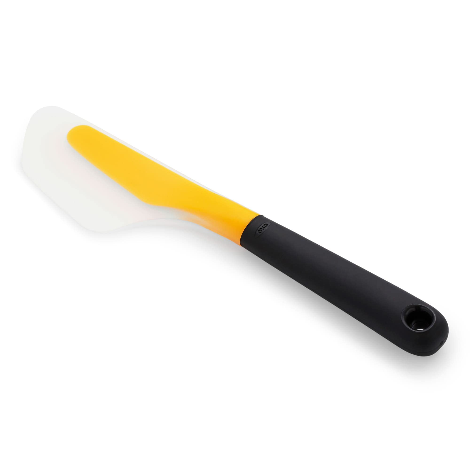 OXO Good Grips silicone head is heat resistant for high-heat cooking.