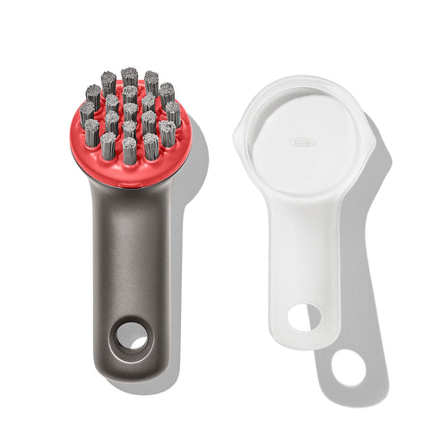 OXO Outdoor Heavy Duty Brush with Cover in main view for rugged cookware cleaning.
