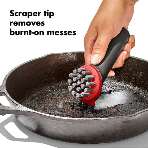 OXO Outdoor Heavy Duty Brush cleaning ridged cookware patterns.