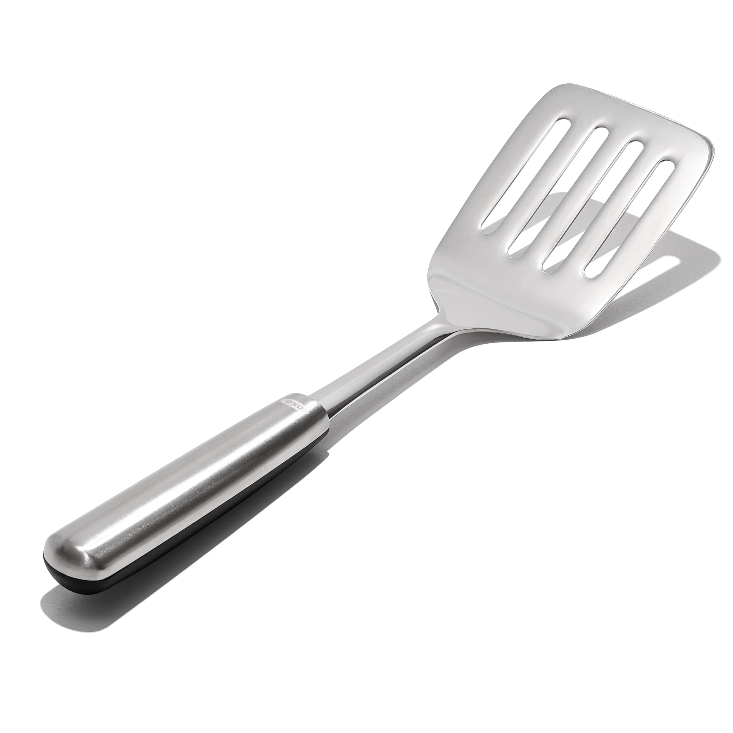 OXO Steel Cooking Turner stainless steel handle with non-slip grip for confident lifting.