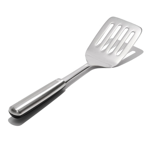 OXO Steel Cooking Turner stainless steel handle with non-slip grip for confident lifting.