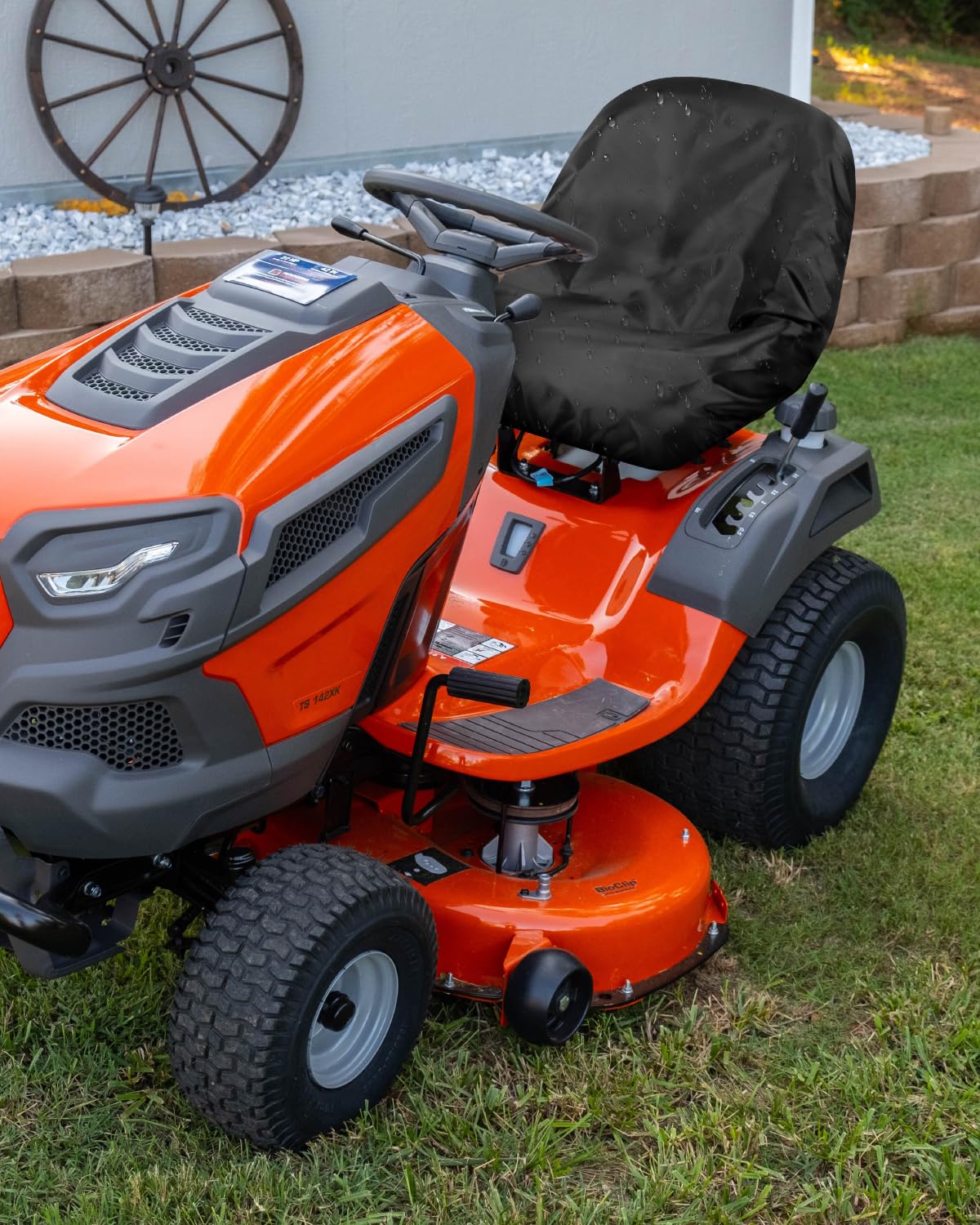 PACETAP seat cover installed on a mower, showing full coverage