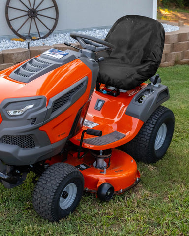 PACETAP seat cover installed on a mower, showing full coverage