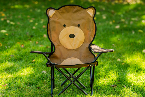 Bernie the Bear Play Chair folded for travel demonstrates compact storage with carry bag