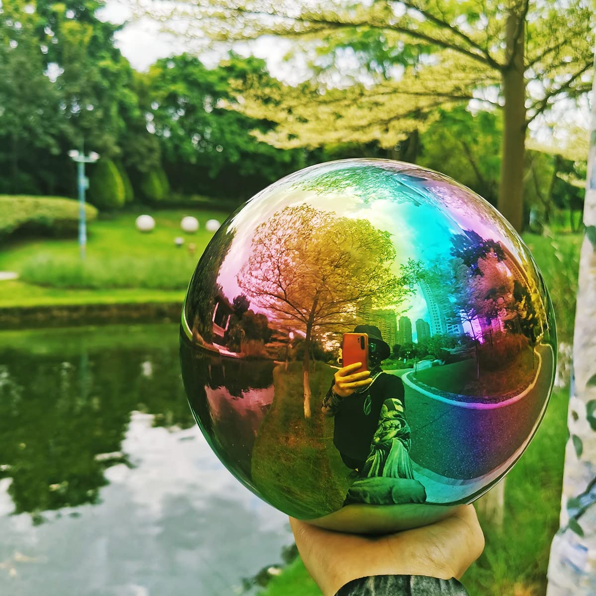 Reflective globe enhances patios and pathways with light play.