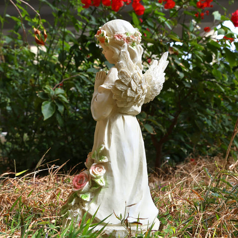 Panven garden angel at dusk glow enhances evening ambiance in the garden.