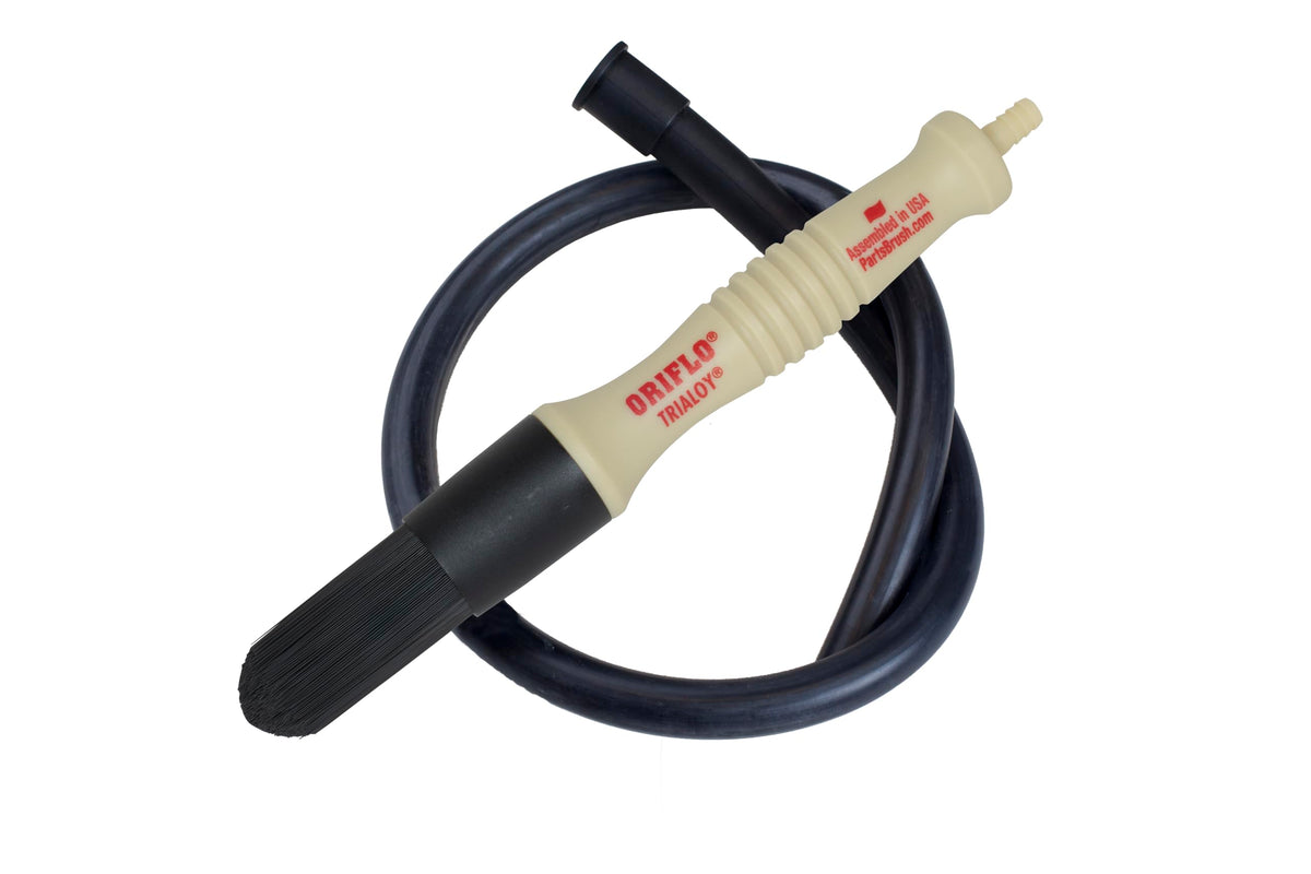 Parts Brush Division Oriflo hose connector in action for efficient flow-through cleaning