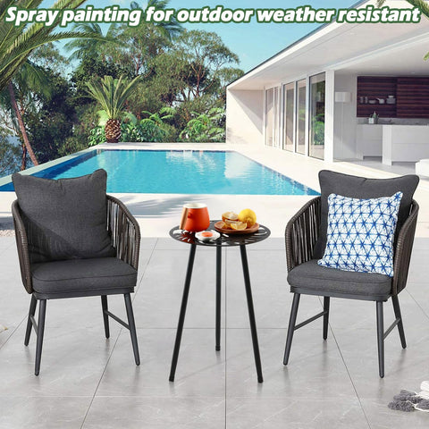 Party Zealot Monstera leaf outdoor side table in a patio setting.