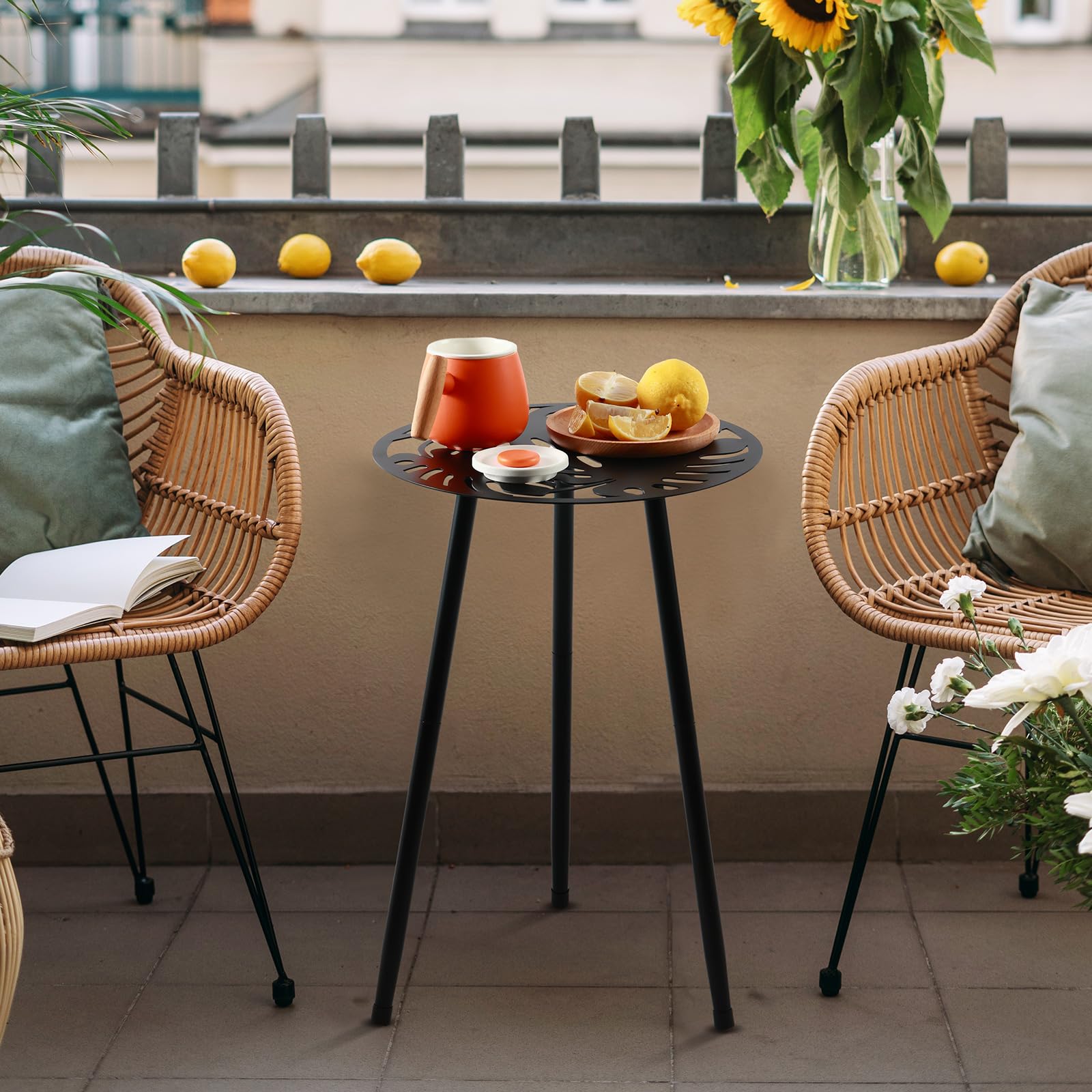 Party Zealot round Monstera design table used as an indoor plant stand.