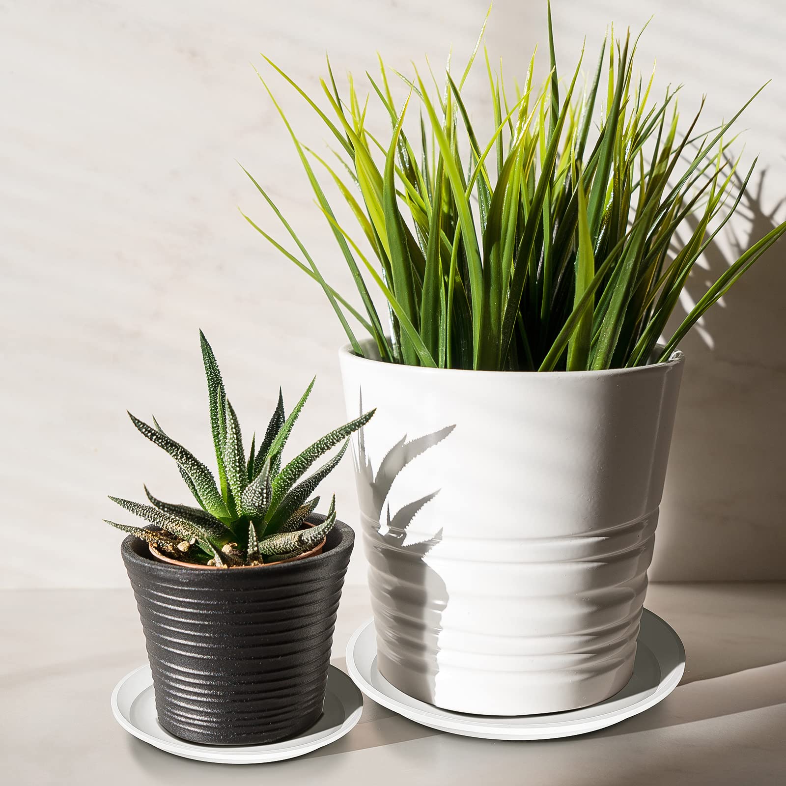 Patelai stackable plant saucers save space when not in use.