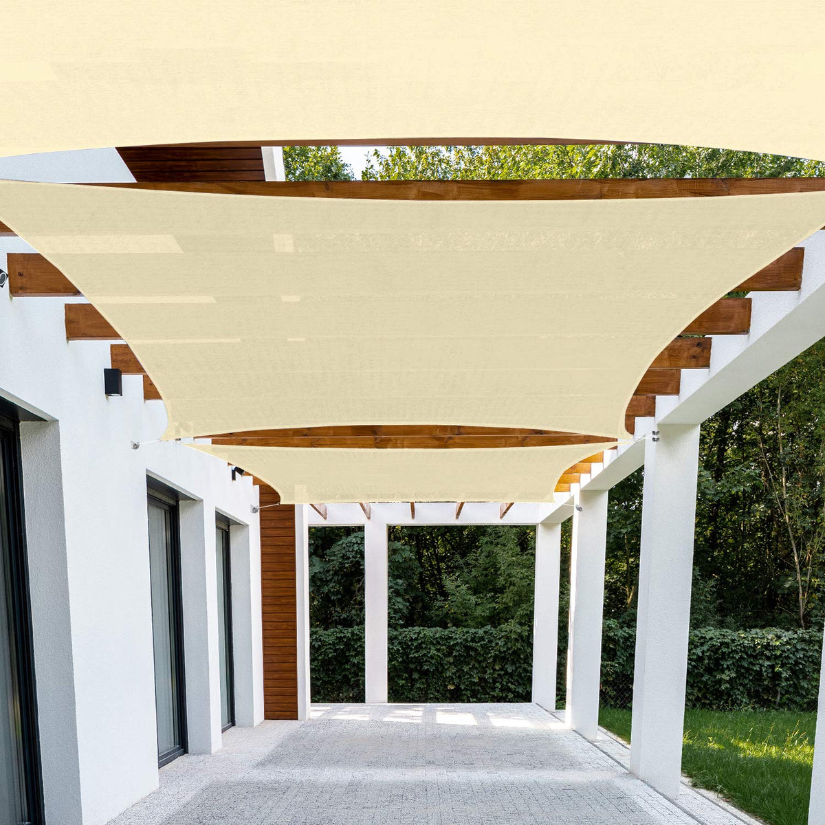 Patio Paradise 8x8 beige shade sail installed, providing cool backyard shade.