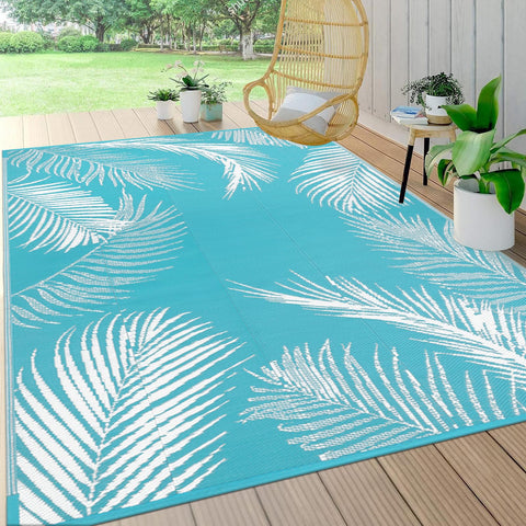 Pauwer Leaf Teal outdoor rug close-up showing durable waterproof polypropylene for easy maintenance