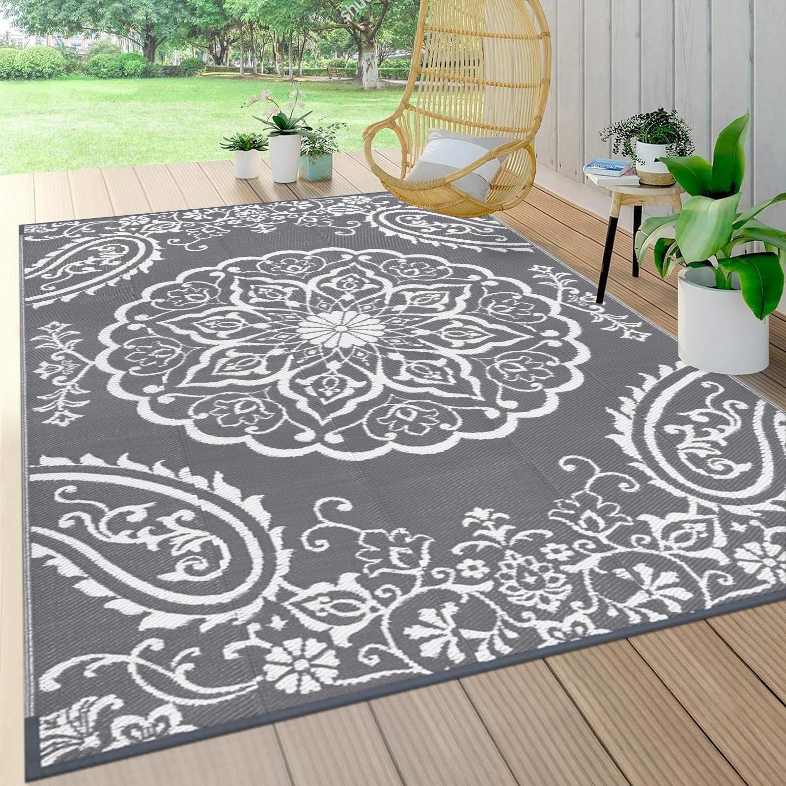 Pauwer outdoor rug 5x8, reversible floral pattern for patio decor.