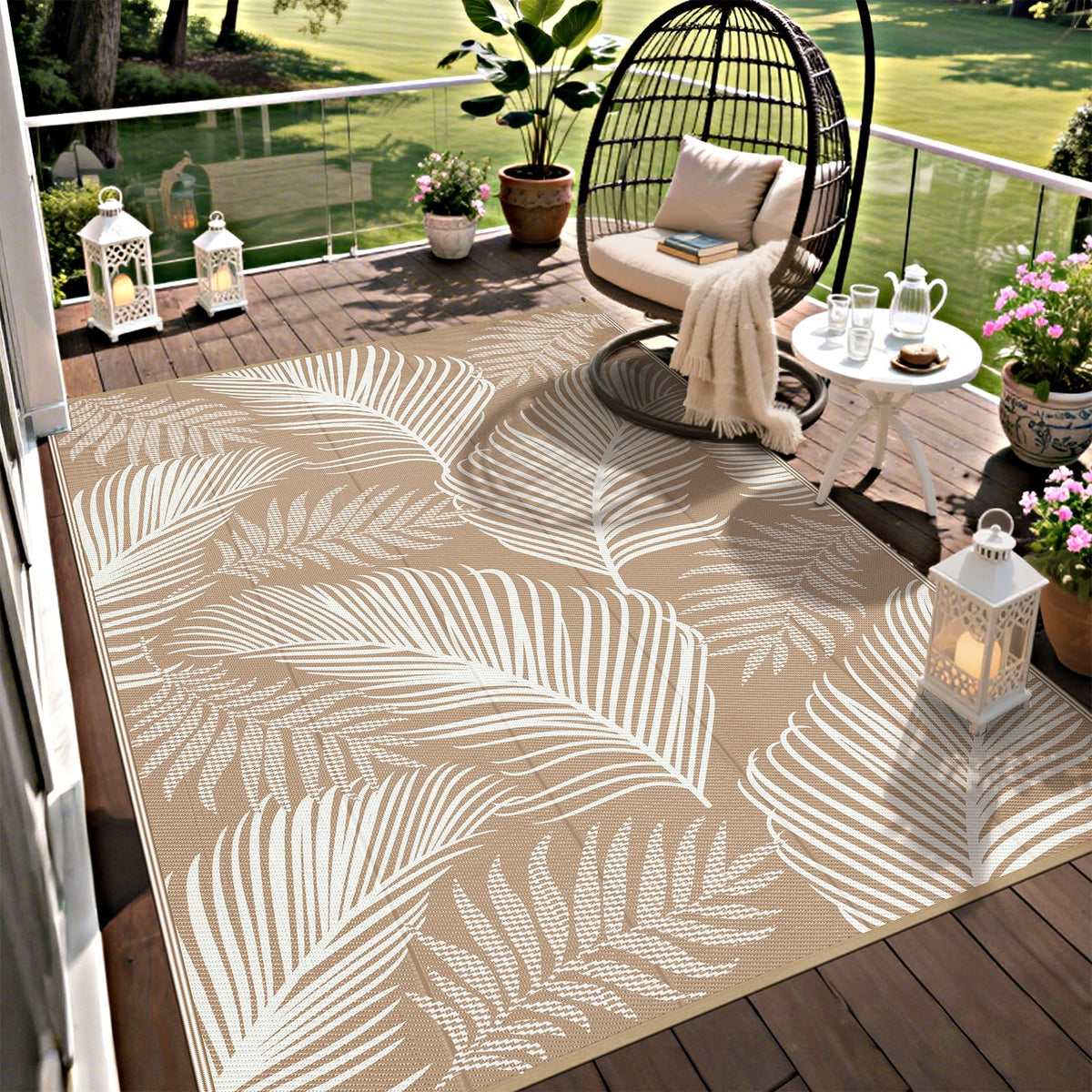 Pauwer outdoor rug with leaf pattern, reversible for two looks on deck or patio.