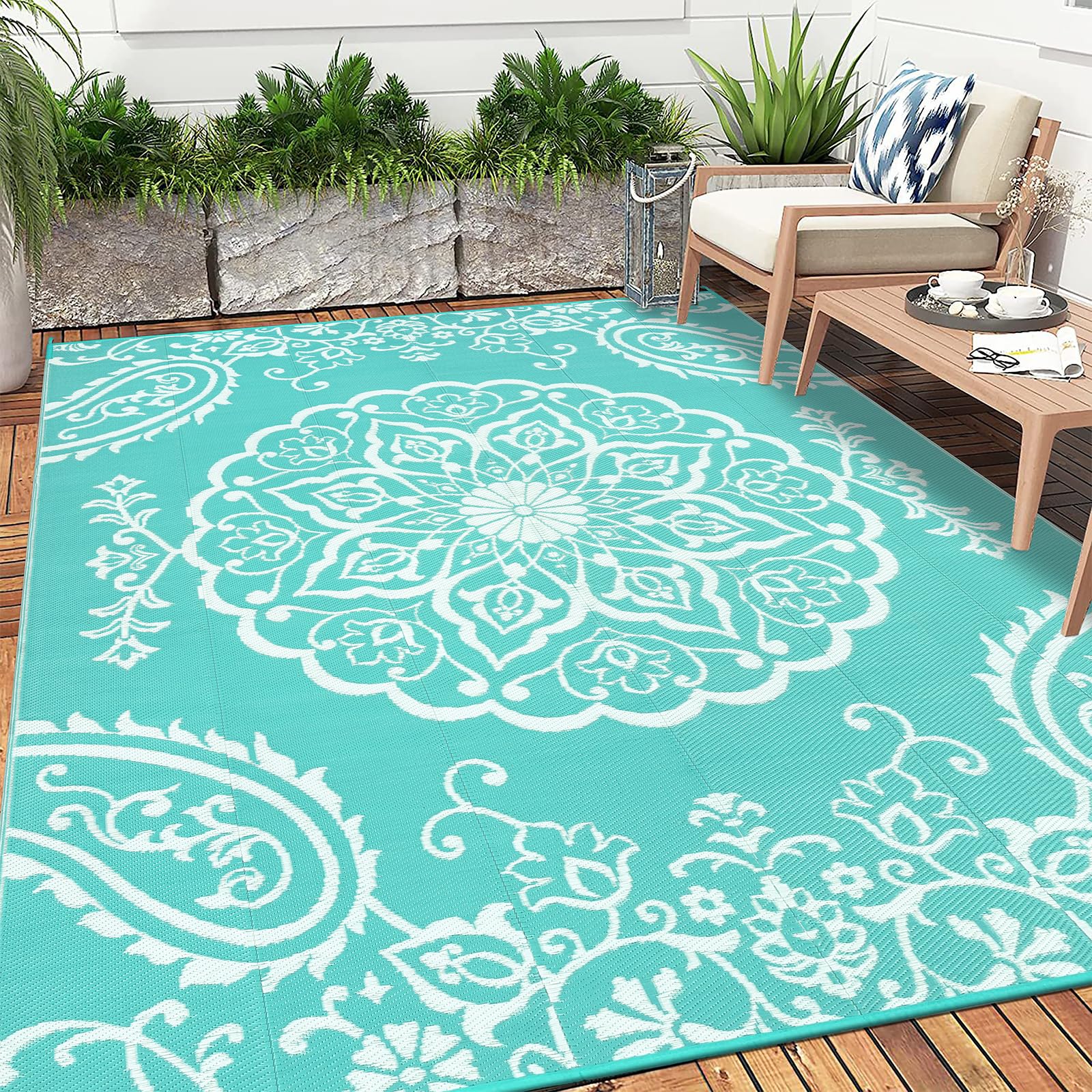 Pauwer 8x10 outdoor rug on a deck, keeps space clean and inviting.