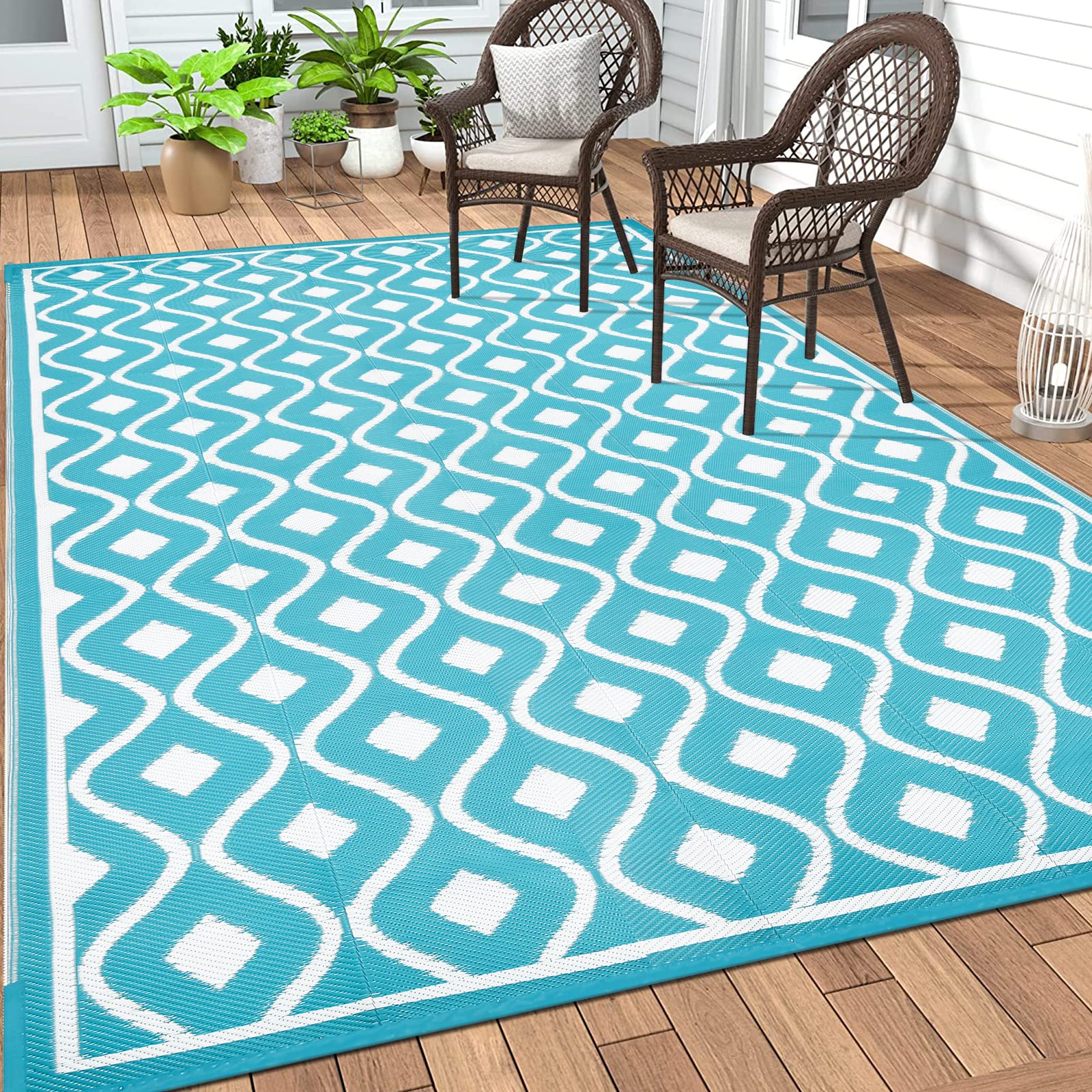 Pauwer outdoor rug 9x12 reversible teal geometric for versatile patio decor.