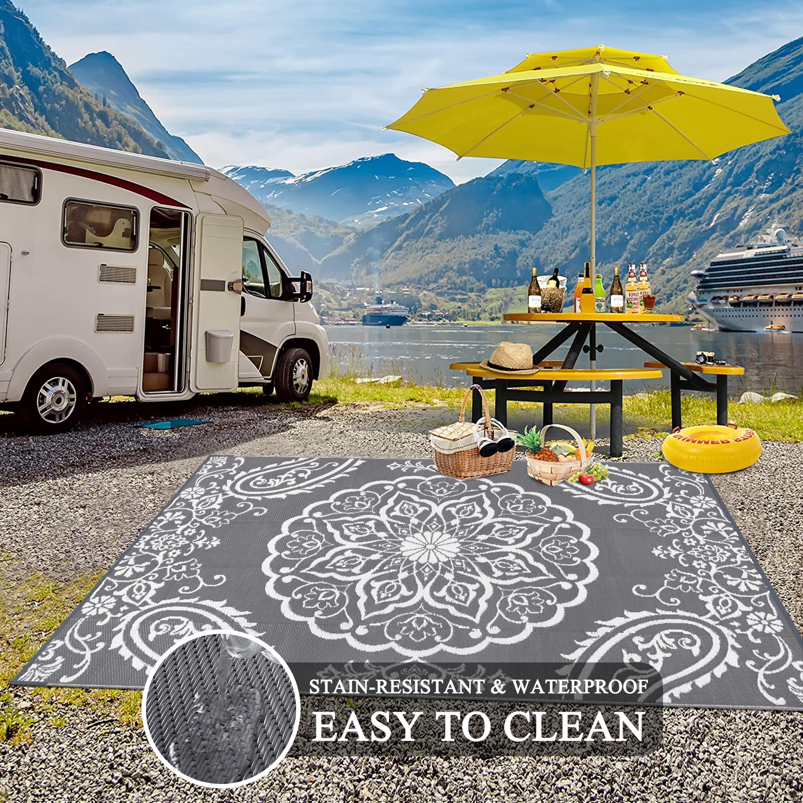 Pauwer RV camping mat includes stakes for secure placement.