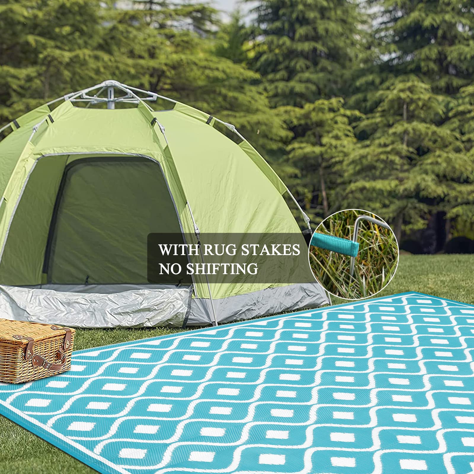 Pauwer RV camping use teal rug secured with stakes on rugged terrain.