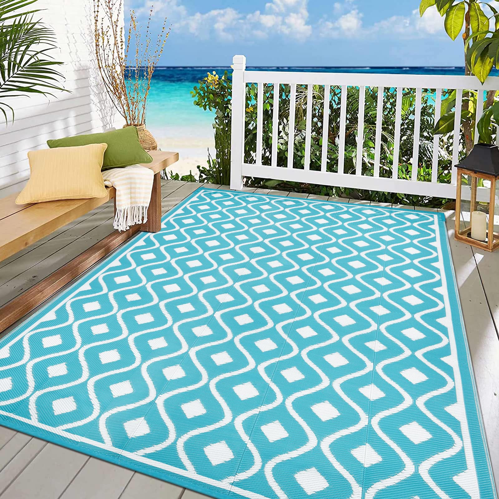 Pauwer UV-coated rug with colorfast teal finish for lasting outdoor color.