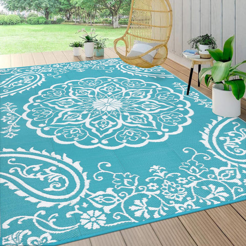 Pauwer outdoor rug 10x14 floral front view adds charm and weatherproof durability