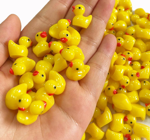 Pcxino resin ducks add charm to an aquarium display