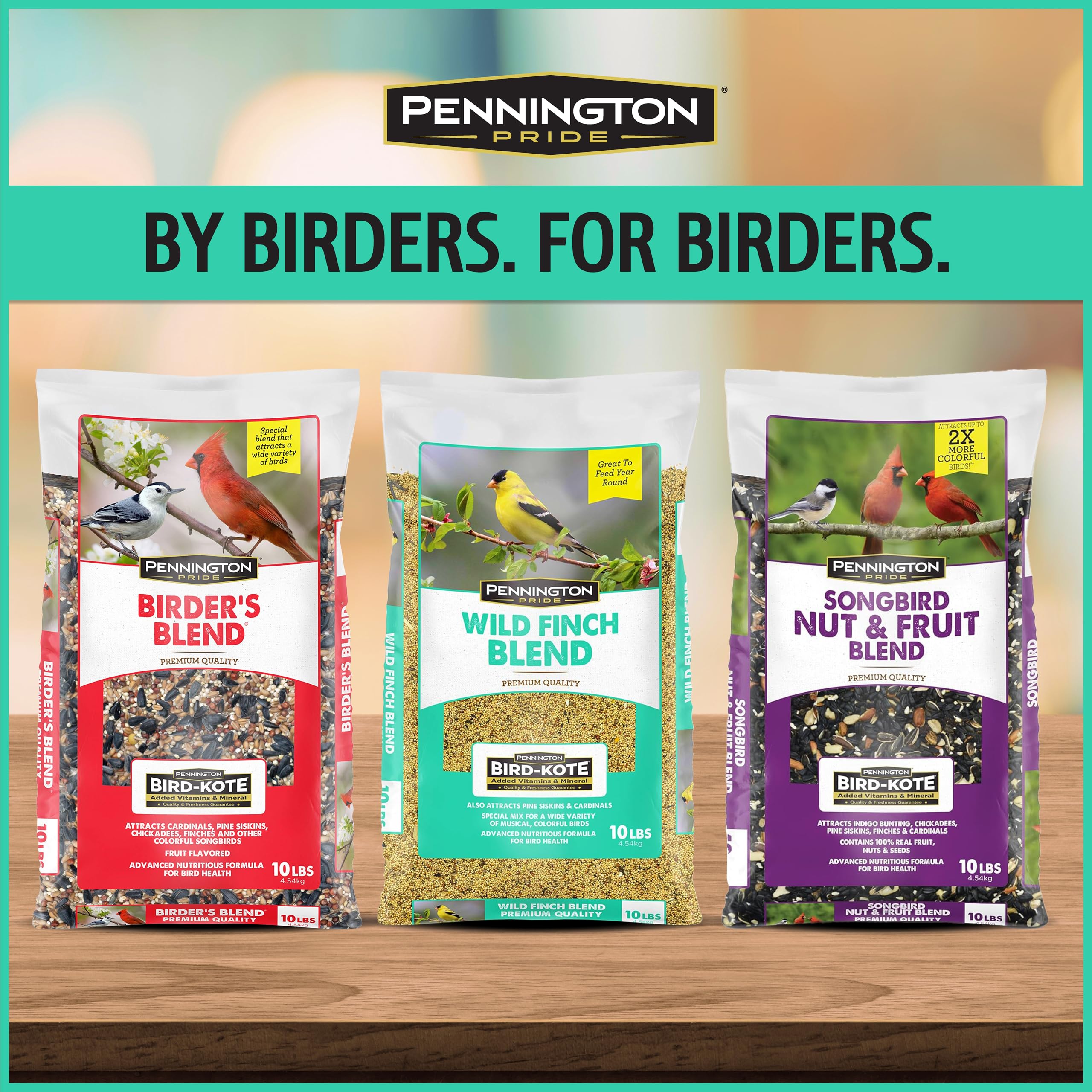 Pine siskins perched and enjoying Pennington Pride Wild Finch Blend