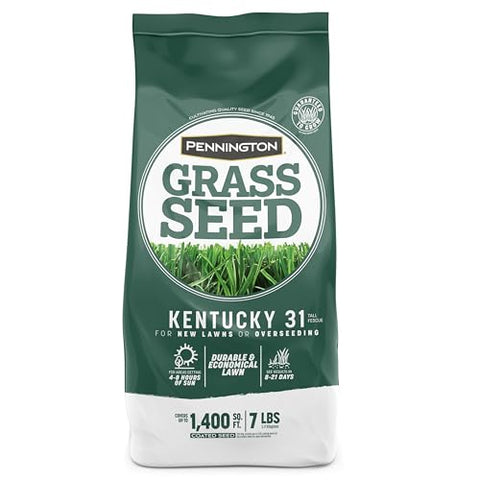 Pennington seed being spread with a spreader for wide coverage.