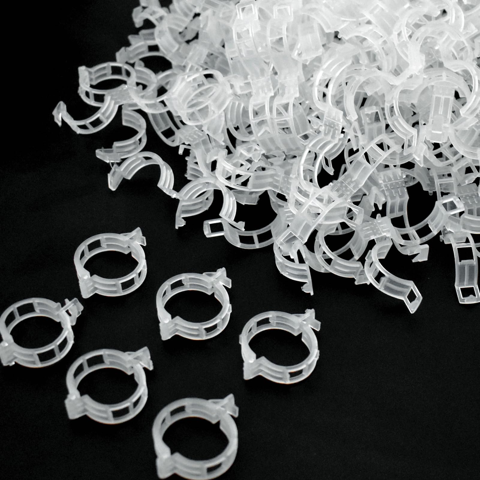 PEOUWNES 200-pack plant support clips for sturdy garden organization.