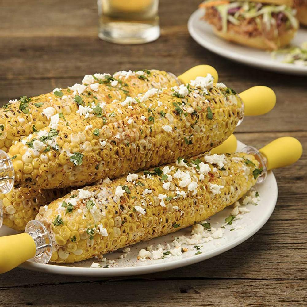 Handy skewers providing a secure grip on a hot cob during grilling