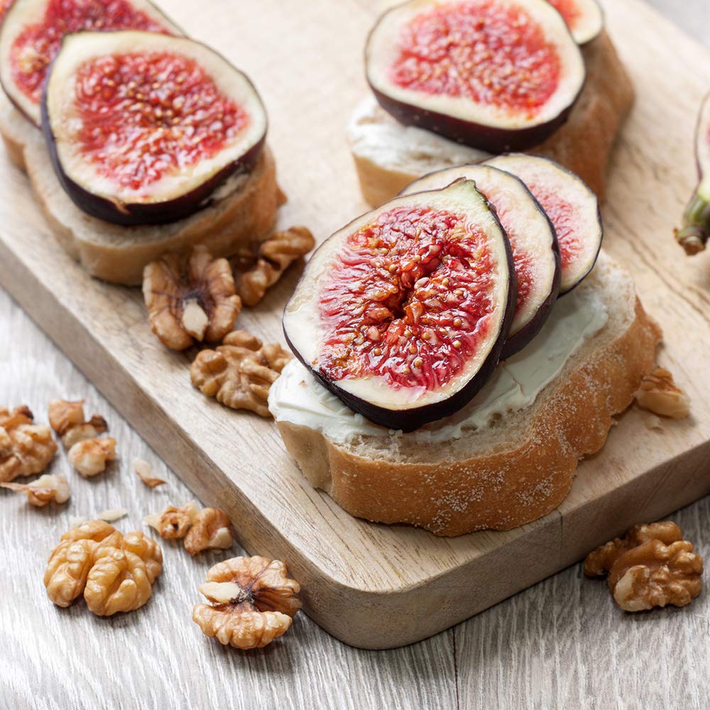 PERFECT PLANTS Chicago Hardy fig fruit displays deep purple flesh with maroon tones.
