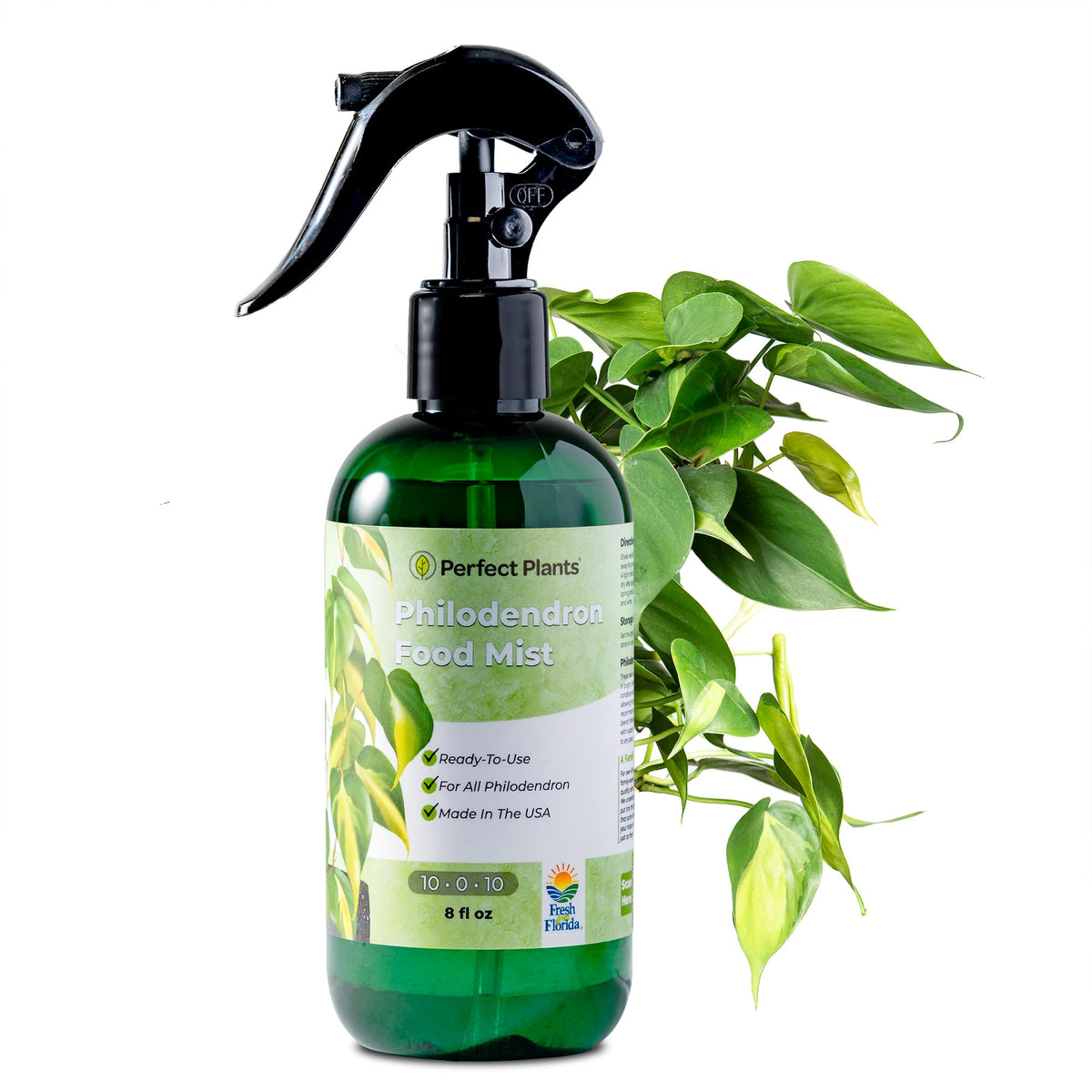 Perfect Plants philodendron foliar mist bottle ready for use on lush leaves