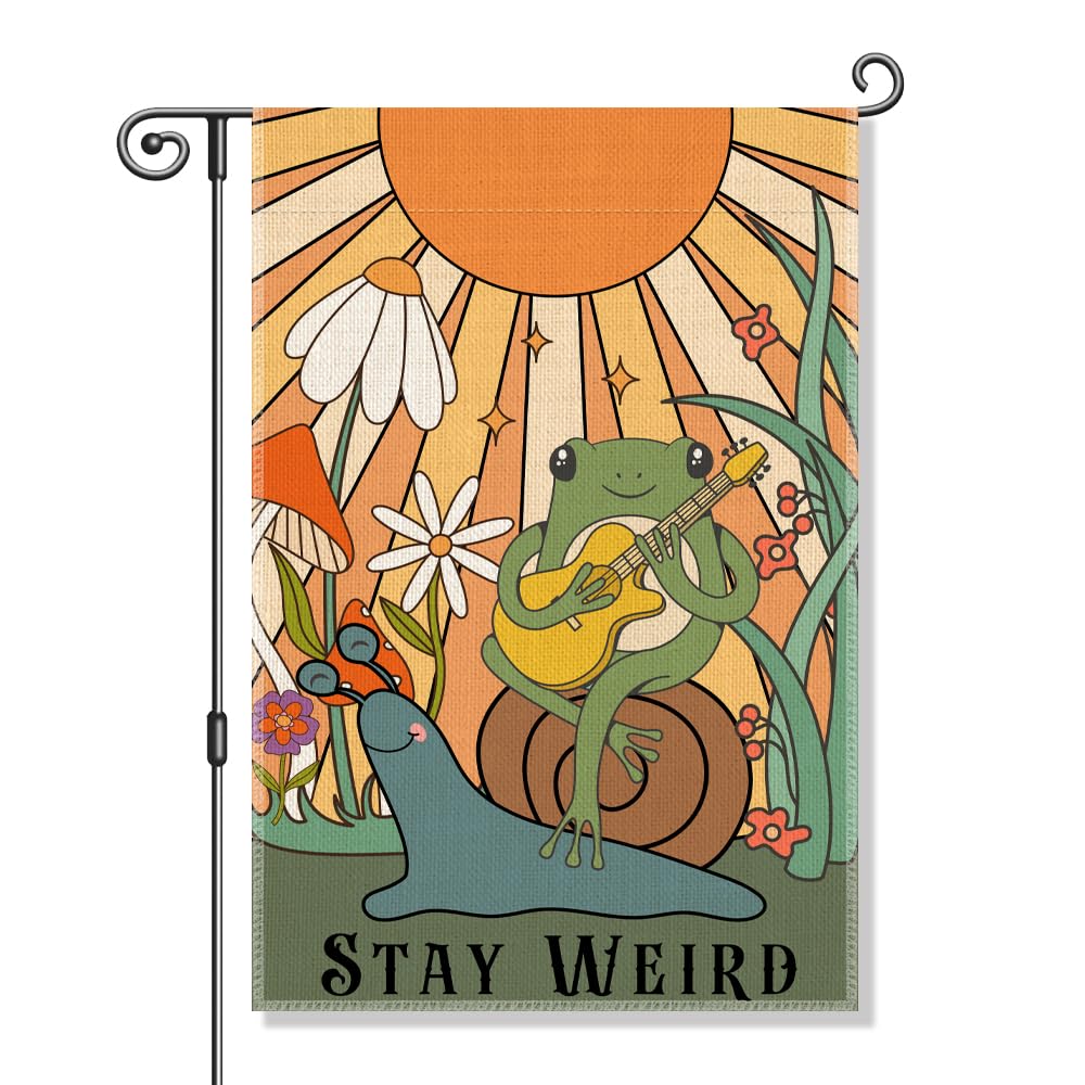 Perfectinsoy Stay Weird flag with snail and frog design adds whimsy to garden.